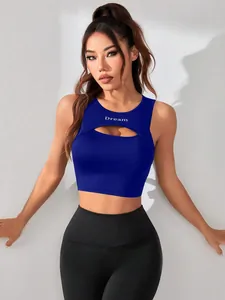 Detailed view of women blue cutout sports tank top featuring Dream letter print on chest