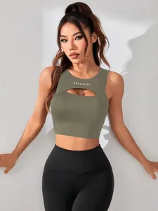 Detailed view of olive green cutout sports tank top with Dream print.