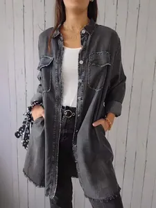 Oversized washed grey denim shirt jacket for women with frayed hem and pockets