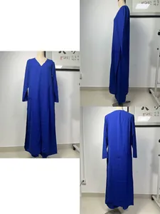 Royal blue long-sleeved tunic top with high side slits shown from multiple angles