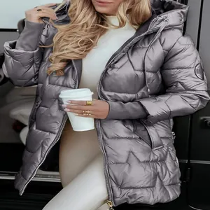 Stylish metallic silver hooded winter jacket for women featuring a quilted star pattern detail