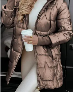 Detailed view of women's bronze hooded puffer jacket with star-patterned quilting