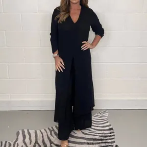 Elegant black summer 2-piece set featuring a long slit top and matching wide-leg pants