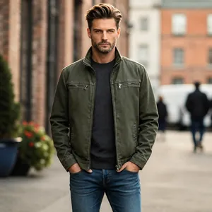 Detail of olive green men's vintage workwear jacket in casual urban street style