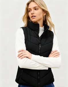 Fashionable women's black quilted puffer vest with zipper closure and high neck detail