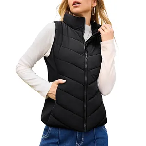 Detail view of women's black quilted puffer vest with zipper closure and stand collar