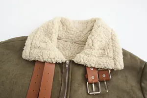 Close-up of men's winter shearling jacket with large collar and buckle details