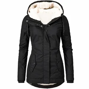 Detailed view of a women's black winter parka coat with a white fleece-lined hood