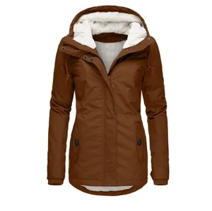 Detailed view of a brown women's hooded winter parka jacket with warm white fleece lining