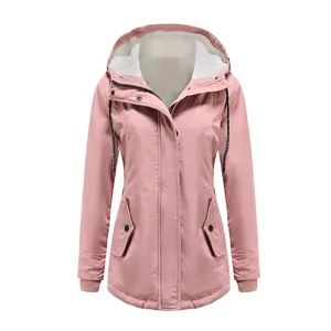 Detailed view of a stylish women's pink winter parka with white fleece lining and hood