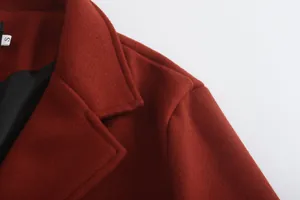 Macro view of high-quality red wool overcoat showing collar and shoulder detail