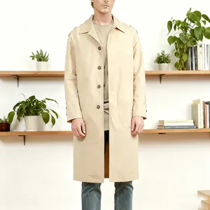 Detailed view of a slim fit single-breasted men's khaki trench coat with lapel collar.