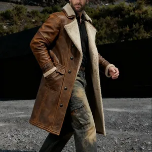 Detailed lifestyle shot of a men's vintage brown suede coat with faux shearling lining