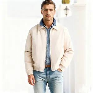 Professional shot of men's minimalist beige zipper jacket with lapel collar.