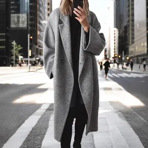 Elegant women's long grey wool coat in oversized street style for winter fashion