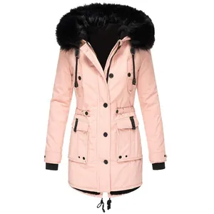 Front view detail of a pink women's winter parka jacket with black fur-trimmed hood