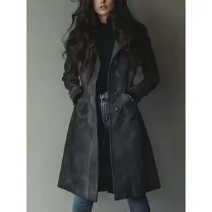 Elegant charcoal gray suede coat for women featuring a slimming waist and button details
