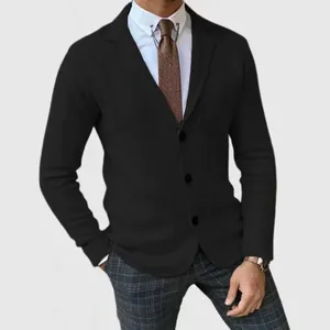 Detail of a men's slim fit black knit blazer with classic British style styling