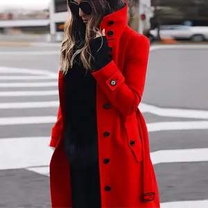 Detailed view of a vibrant red women's wool coat featuring black buttons and a waist belt.