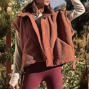 Soft sherpa fleece vest for women in rustic orange, warm outdoor sleeveless jacket detail