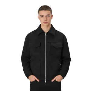 Detail view of men's black suede jacket with lapel and large front pockets