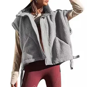 Cozy grey lamb wool vest for women with stand collar and zipper closure, perfect for winter.