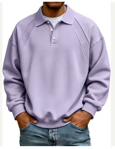 Detail of men's lavender polo sweatshirt with ribbed shoulder texture and white buttons.