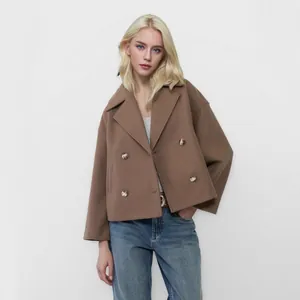 Stylish brown short wool pea coat for women with large lapels and double-breasted buttons.