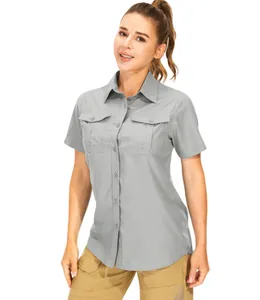 Front view of a grey outdoor shirt with multi-pockets paired with tan cargo pants