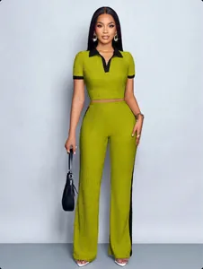 Full-length view of women's two-piece olive green set with polo top and wide-leg pants