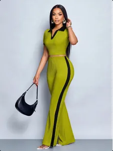 Lime green two-piece ribbed set with black contrast polo collar and side stripe flare pants