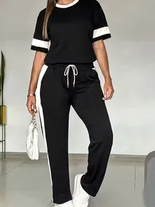 Completo casual donna due pezzi con top a manica corta e pantaloni a righe