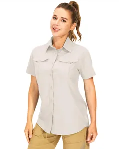 Detailed front view of women's grey outdoor shirt featuring functional chest pockets