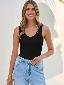 Detail view of a stylish black ribbed V-neck tank top for women in a sunny outdoor setting