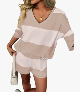 Detailed view of women's striped two-piece lounge set with V-neck top and matching shorts