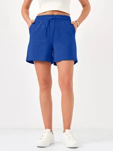 Comfortable women's blue casual sports shorts featuring an elastic drawstring waist and pockets