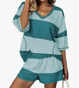 Detailed view of a women's striped two-piece lounge set with a V-neck half-sleeve top