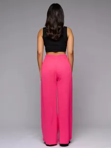 Back view detail of fuchsia pink high-waisted wide-leg loose casual trousers