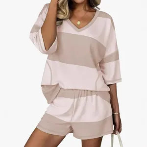Casual women's two-piece set with striped short sleeve V-neck top and matching shorts