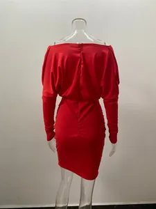 Detailed back view of a sexy red long sleeve bodycon dress on a transparent mannequin