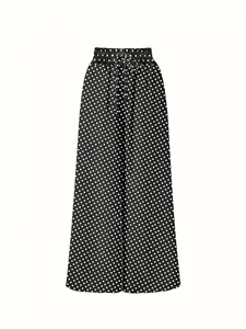 High-waisted polka dot wide-leg trousers featuring drawstring elastic waistband details