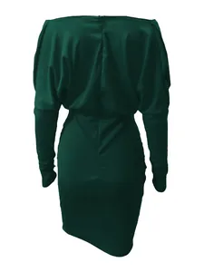Back view of emerald green long sleeve bodycon dress with zipper closure detail.