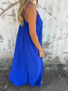 Detailed side view of long royal blue camisole maxi dress featuring delicate lace neckline