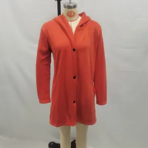 Close-up detail of burnt orange single-breasted hooded fleece jacket for women's winter fashion