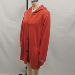 Side view of stylish women's orange fleece hooded jacket with black buttons and pockets
