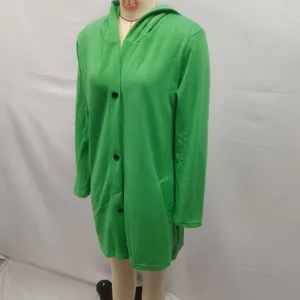 Detail view of a green hooded single-breasted long sleeve fleece coat for women on mannequin