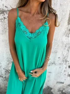 Close-up view of a vibrant green lace trim slip nightgown with a sexy V-neck design.