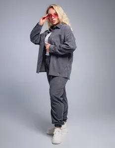 Detailed view of oversized vintage grey corduroy shirt and pants set for women