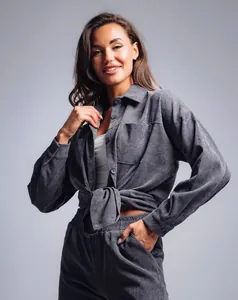 Professional studio shot of retro gray corduroy lapel shirt and matching pants set for women