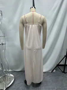 Back view of a long satin nightgown with adjustable spaghetti straps on a mannequin